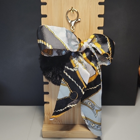 Black and Gold Purse Charm/Keychain With Black Pom Pom And Bow - Picture 1 of 5